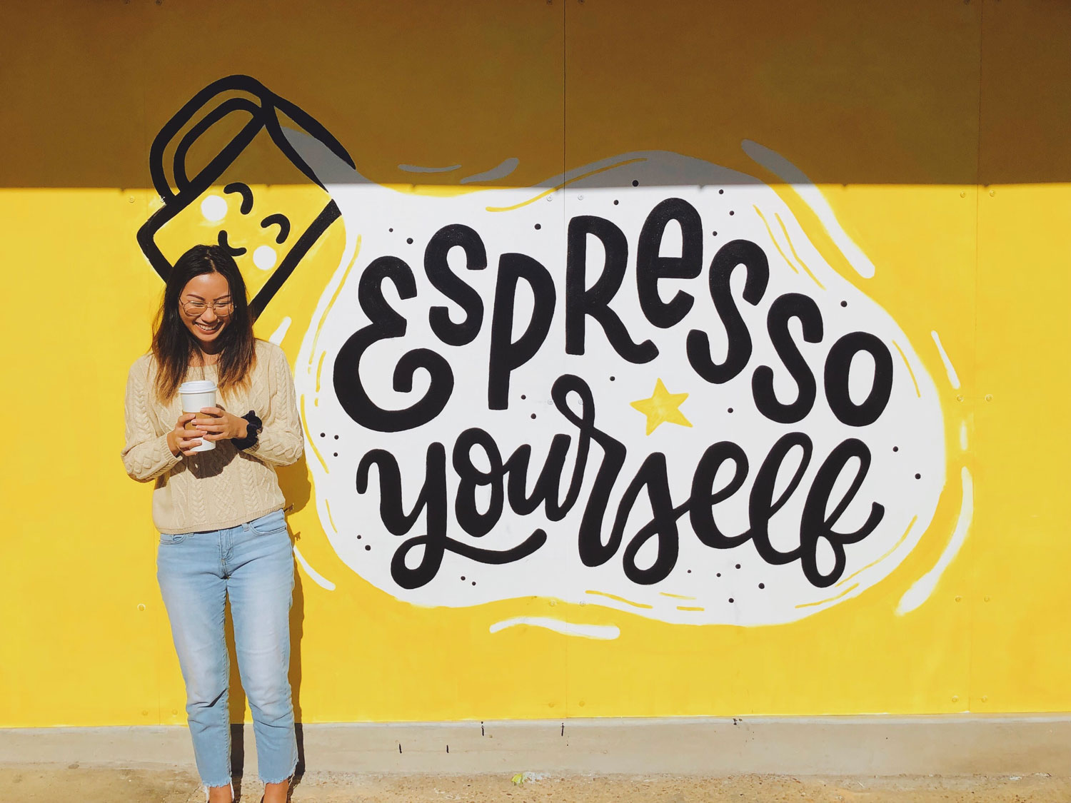 Exterior mural for Austin Java reading "Espresso Yourself"