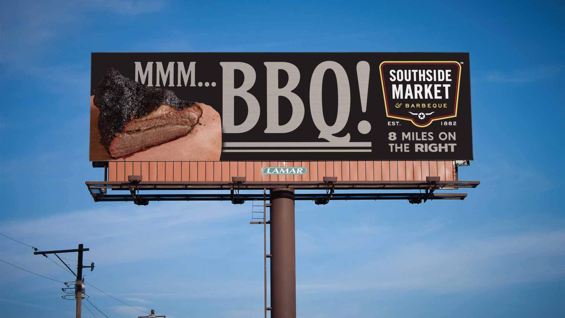 Billboard reading "MMM...BBQ!" designed by Tilted Chair for Southside Market & Barbeque