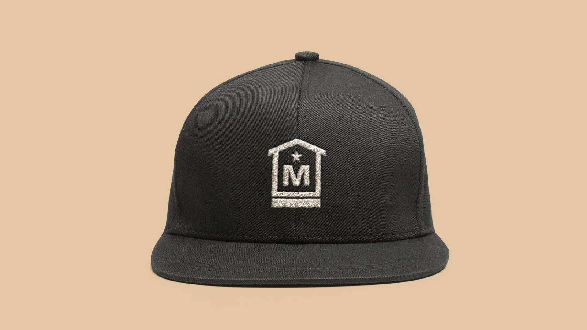 Instantiation of the Marathon Homes secondary logo on a hat. (By branding agency Tilted Chair.)
