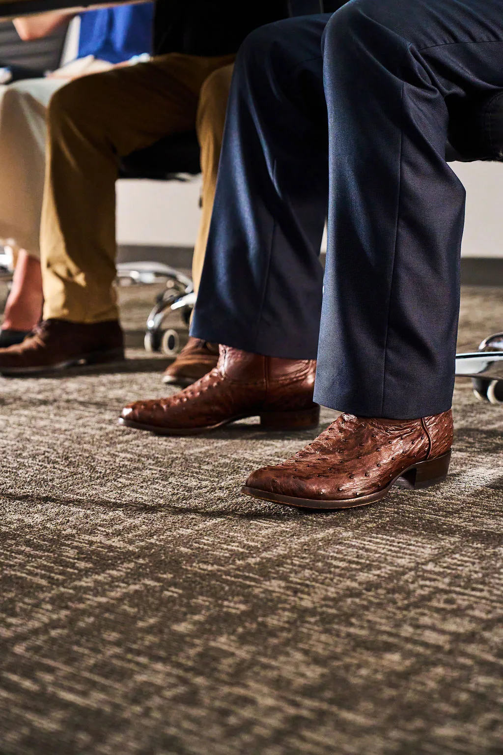 Leather brown Cavender's boots in a meeting
